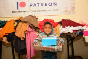 Orphaned children continues receiving Eid al-Fitr clothing from Mona Relief